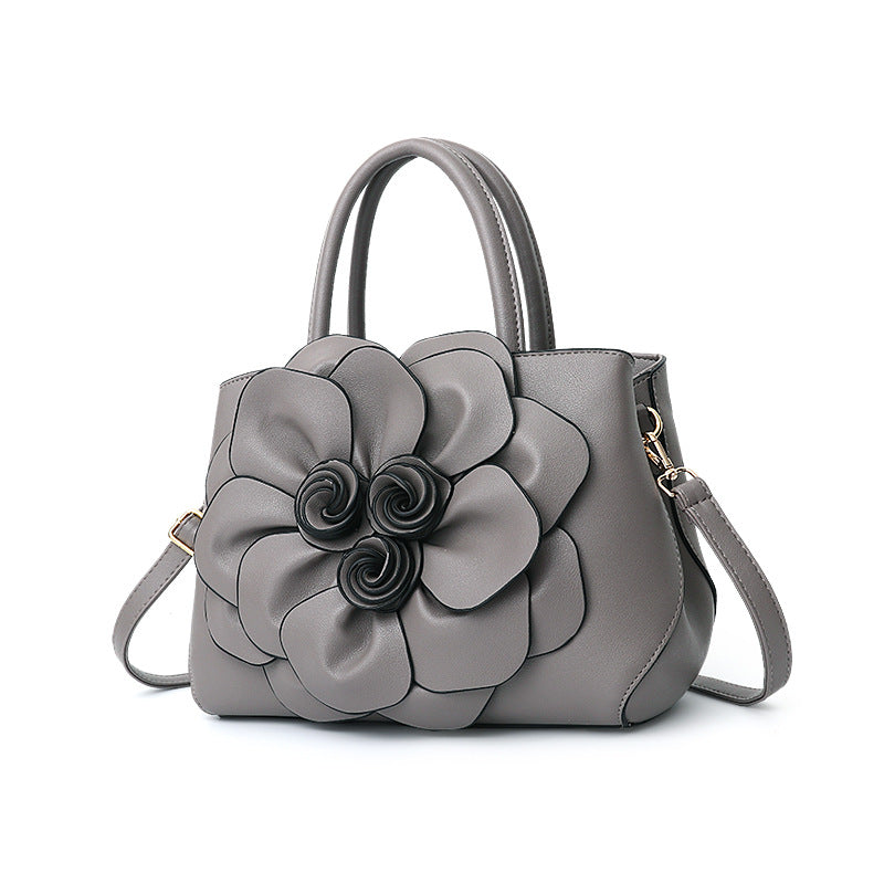 2026 spring solid color new college style women's bag pu leather flower handbag shoulder bag cute bag - dropshipping available