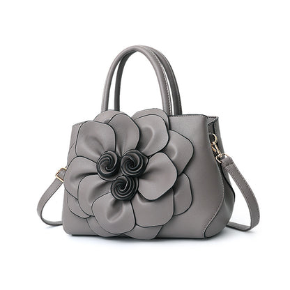 2026 spring solid color new college style women's bag pu leather flower handbag shoulder bag cute bag - dropshipping available