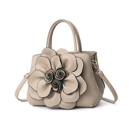 2026 spring solid color new college style women's bag pu leather flower handbag shoulder bag cute bag - dropshipping available