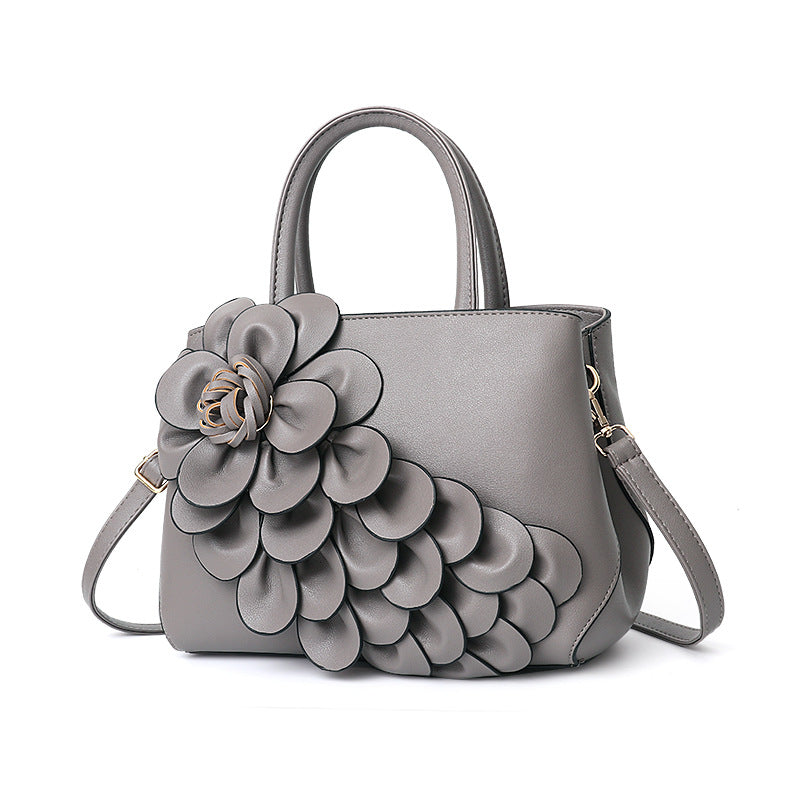 2026 spring solid color new college style women's bag pu leather flower handbag shoulder bag cute bag - dropshipping available