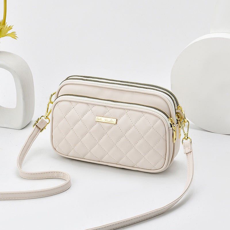 2024 spring new arrival: diamond quilted shoulder bag for women - three-layer practical mom bag, soft leather crossbody commuter bag