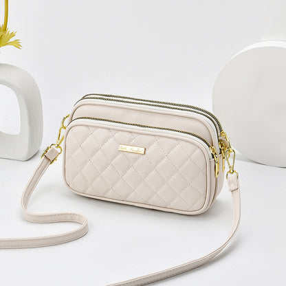 2024 spring new arrival: diamond quilted shoulder bag for women - three-layer practical mom bag, soft leather crossbody commuter bag