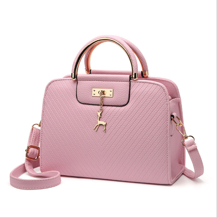2026 spring elegant women's handbag with wavy texture, deer charm, cute shoulder bag, fashionable preppy style crossbody bag