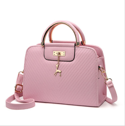 2026 spring elegant women's handbag with wavy texture, deer charm, cute shoulder bag, fashionable preppy style crossbody bag