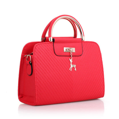 2026 spring elegant women's handbag with wavy texture, deer charm, cute shoulder bag, fashionable preppy style crossbody bag