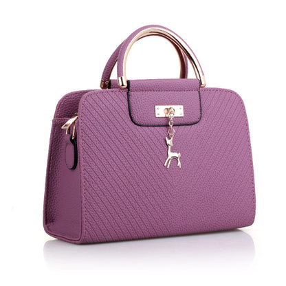 2026 spring elegant women's handbag with wavy texture, deer charm, cute shoulder bag, fashionable preppy style crossbody bag