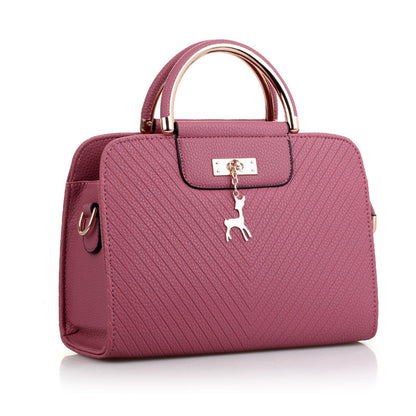 2026 spring elegant women's handbag with wavy texture, deer charm, cute shoulder bag, fashionable preppy style crossbody bag