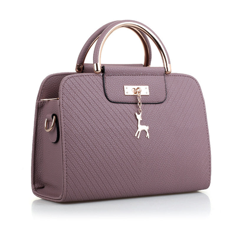 2026 spring elegant women's handbag with wavy texture, deer charm, cute shoulder bag, fashionable preppy style crossbody bag