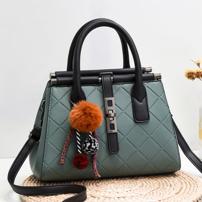 New cross-border trend 2026 fashionable fashiontrendysatchel bag fur ball decoration large capacity embossed cross-body women's bag