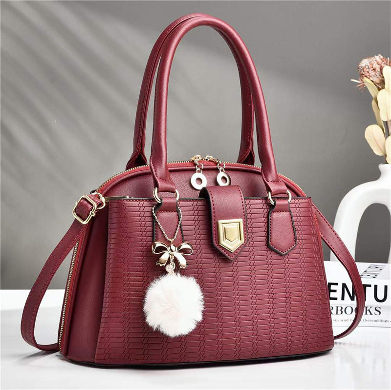 Fashion embossed women's bag 2026 casual large capacity satchel bag k-style high-end new shoulder crossbody bag wholesale