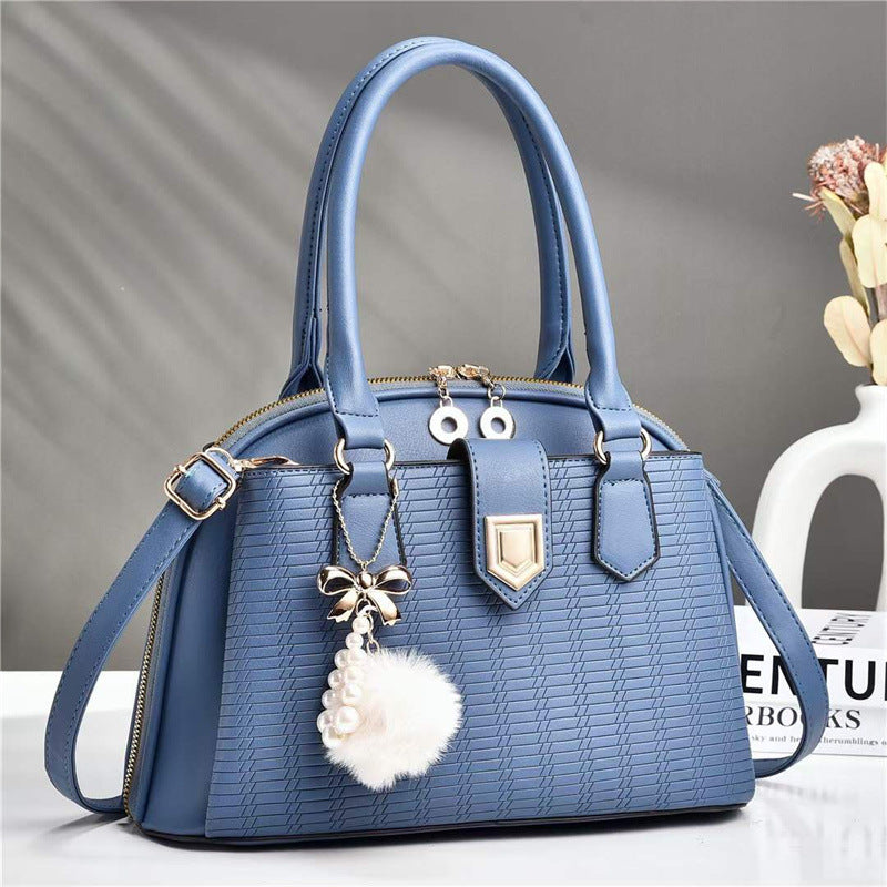 Fashion embossed women's bag 2026 casual large capacity satchel bag k-style high-end new shoulder crossbody bag wholesale