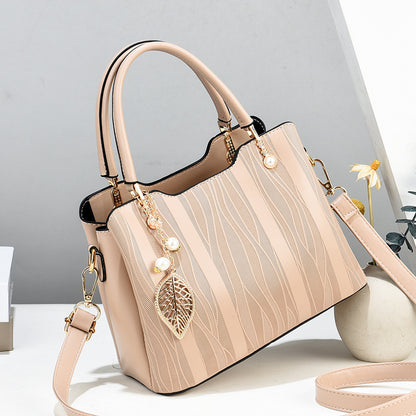 Women's handbag: 2024 fashion trend - new vertical striped, large capacity, middle-aged shoulder bag, high-quality tote, mom bag