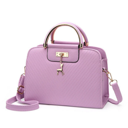 2026 spring elegant women's handbag with wavy texture, deer charm, cute shoulder bag, fashionable preppy style crossbody bag
