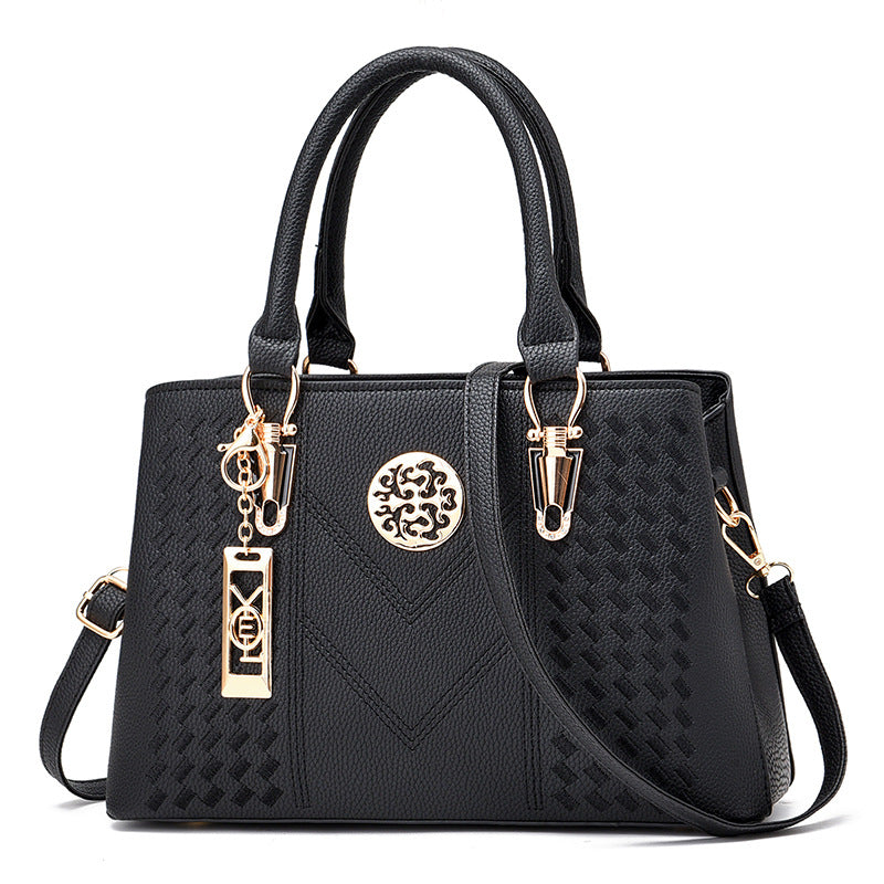 Export women's bag 2026new arrivaltrendyfashion hardware pendant decoration high-end women's shoulder crossbody satchel