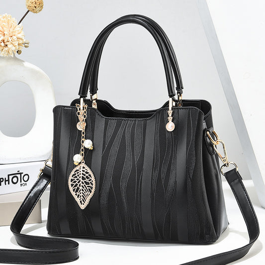 Women's handbag: 2024 fashion trend - new vertical striped, large capacity, middle-aged shoulder bag, high-quality tote, mom bag