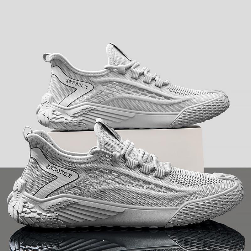 Soft-soled men's shoes, new for spring/summer 2025. flyknit mesh sneakers, breathable running and casual athletic shoes. lightweight knitted trendy footwear