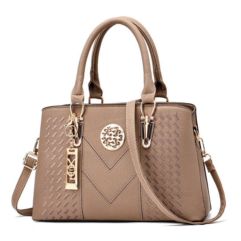 Export women's bag 2026new arrivaltrendyfashion hardware pendant decoration high-end women's shoulder crossbody satchel