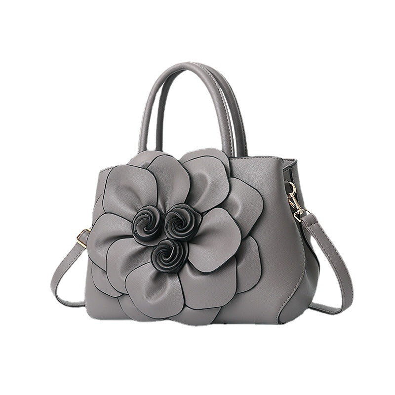 2026 spring solid color new college style women's bag pu leather flower handbag shoulder bag cute bag - dropshipping available