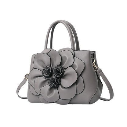2026 spring solid color new college style women's bag pu leather flower handbag shoulder bag cute bag - dropshipping available