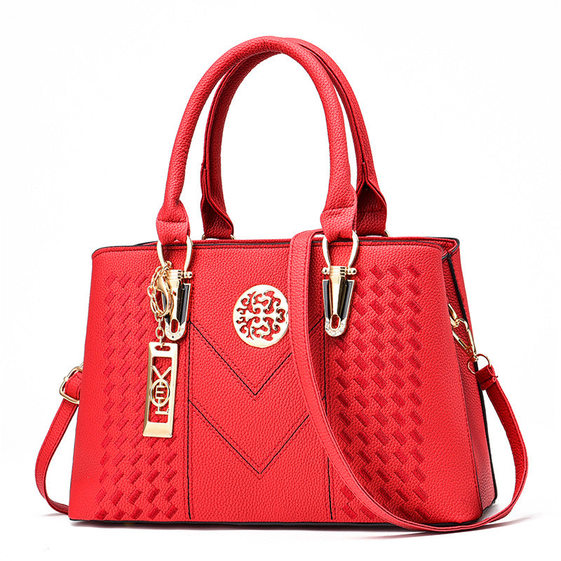 Export women's bag 2026new arrivaltrendyfashion hardware pendant decoration high-end women's shoulder crossbody satchel