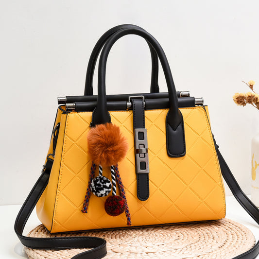 New cross-border trend 2026 fashionable fashiontrendysatchel bag fur ball decoration large capacity embossed cross-body women's bag