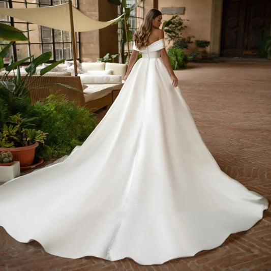 Bridal off-the-shoulder wedding dress - elegant bandeau satin slim-fit ball gown
