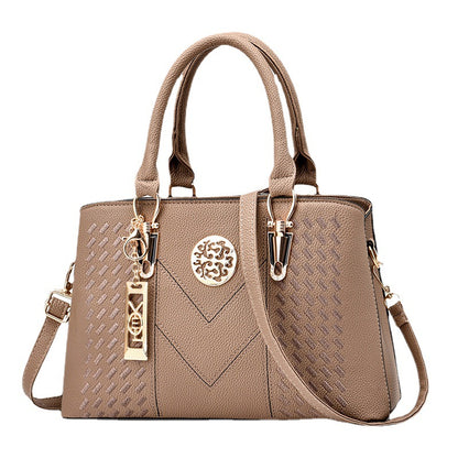 Export women's bag 2026new arrivaltrendyfashion hardware pendant decoration high-end women's shoulder crossbody satchel