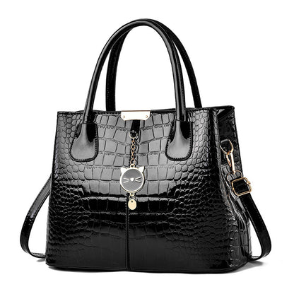 Glossy leather handbag - 2026 spring new arrival: trendy and stylish mom bag, large capacity, embossed design, shoulder & crossbody bag