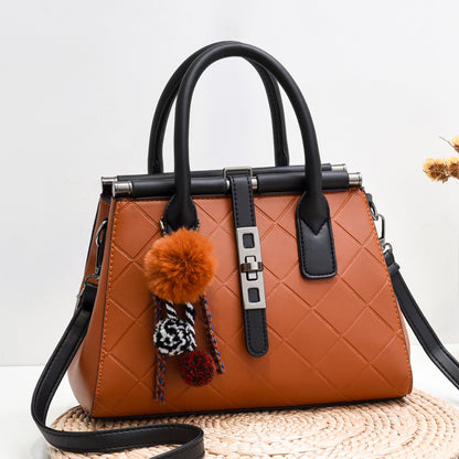 New cross-border trend 2026 fashionable fashiontrendysatchel bag fur ball decoration large capacity embossed cross-body women's bag