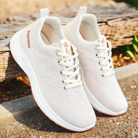 Jinshiyuan |   Women's spring collection: breathable mesh sneakers - soft sole, comfortable running shoes, stylish casual shoes.