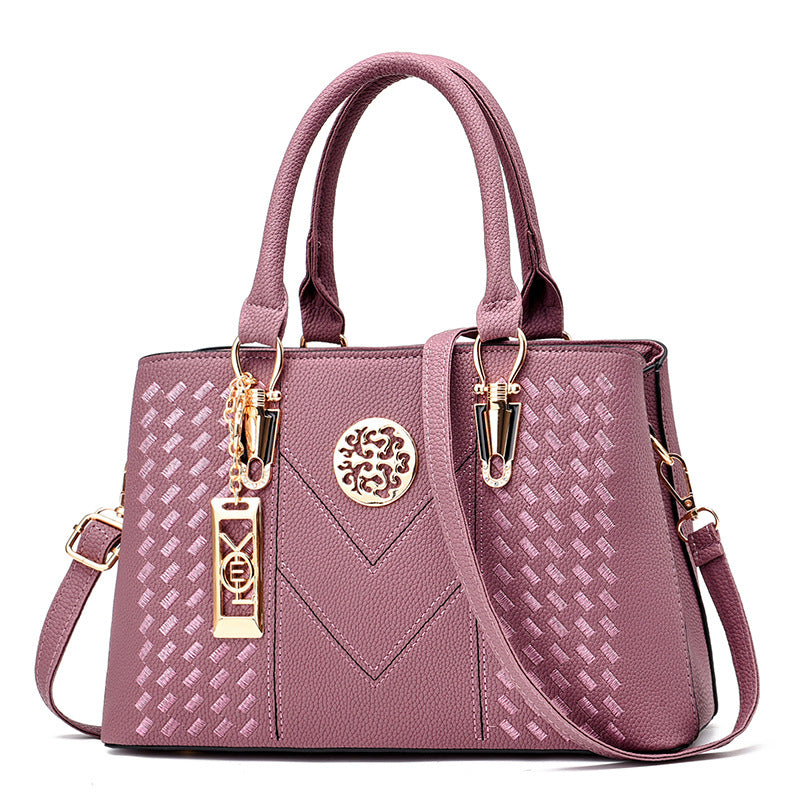 Export women's bag 2026new arrivaltrendyfashion hardware pendant decoration high-end women's shoulder crossbody satchel