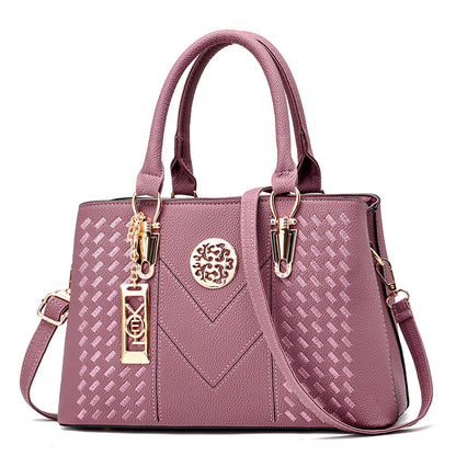 Export women's bag 2026new arrivaltrendyfashion hardware pendant decoration high-end women's shoulder crossbody satchel